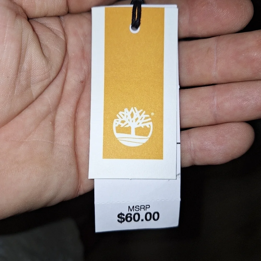 A Timberland white/ lt. brown plaid scarf that's 67